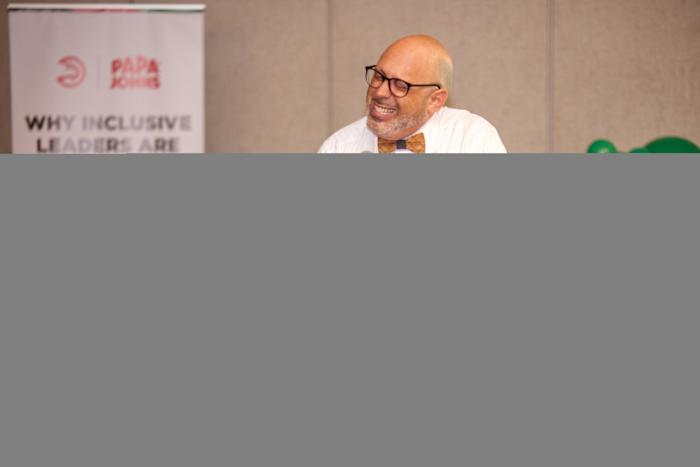 Dr. Derek Greenfield speaks at Hawks x Papa Johns Inclusive Leadership Workshop